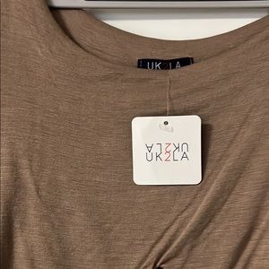 Brown open cut long sleeve jumpsuit with sheer bottoms